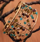 Wire and Bead Cuff, Each strand of wire is adorned with tasteful beads, in hues of light blue, olive green and earthy purple.  A fusion of East and West, modern and traditional, classic and trendy